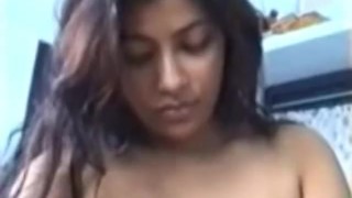 Indian bitch flashing her tits and blowing a cock